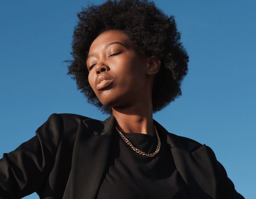 a woman with her eyes closed