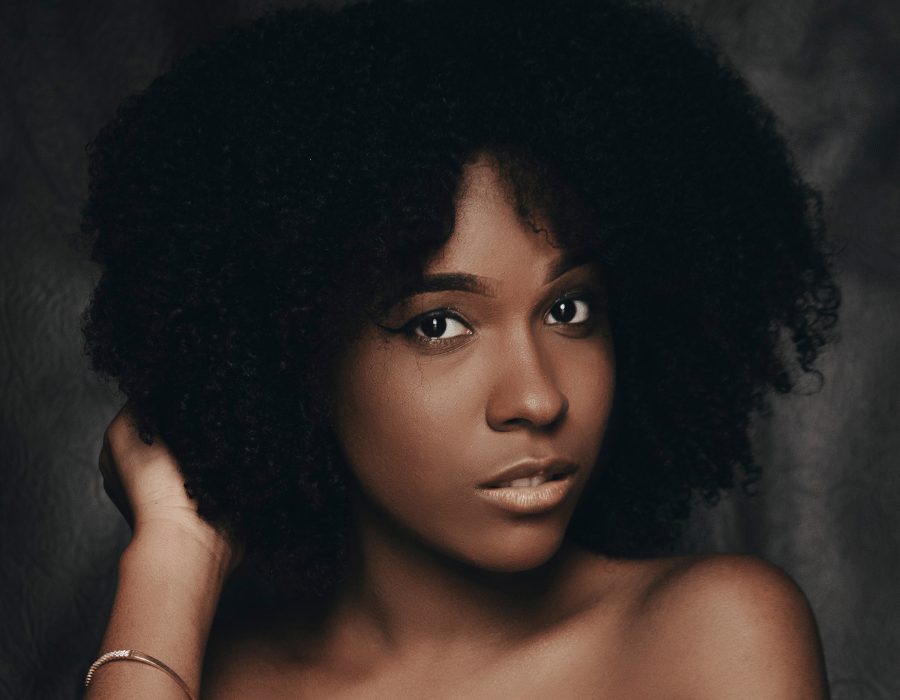 a woman with curly hair