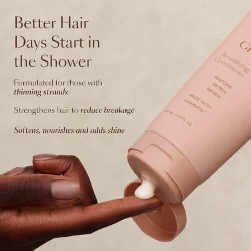 a person putting a conditioner on their finger