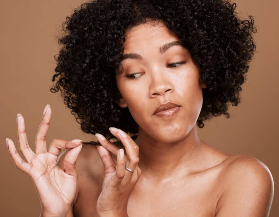 a woman with curly hair