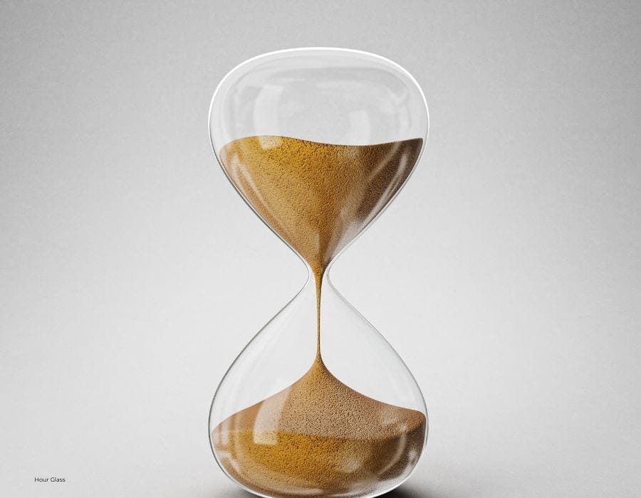 sand running through a hourglass